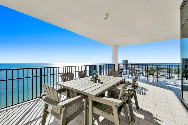 Balcony dining with a Gulf view, Oasis Unit 2201